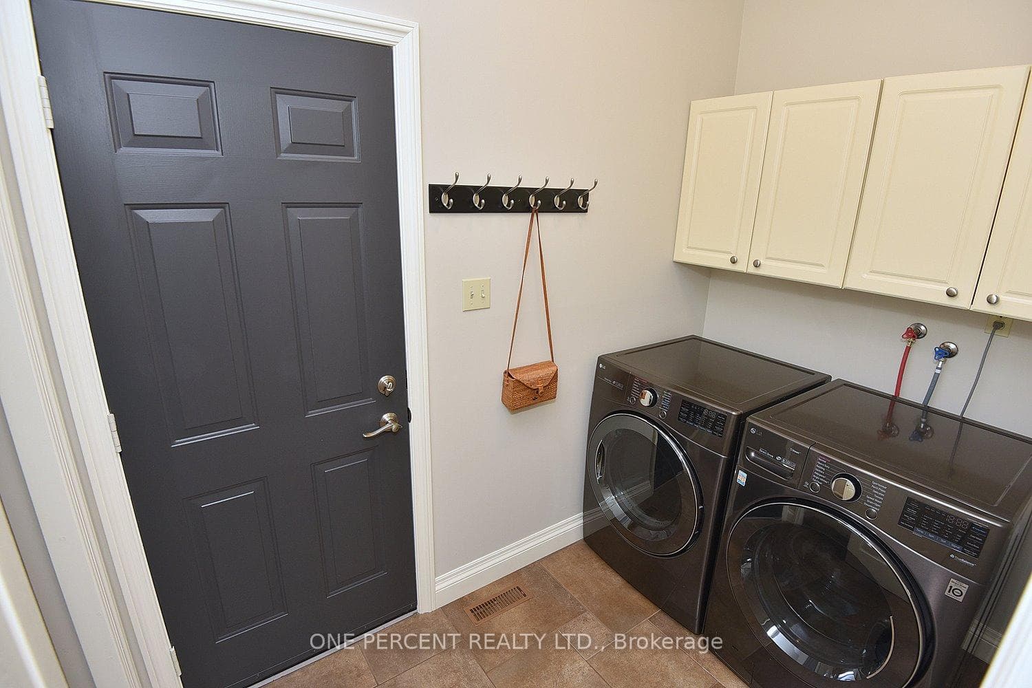 Inside Entry from Dbl Garage & Main Lvl Laundry!