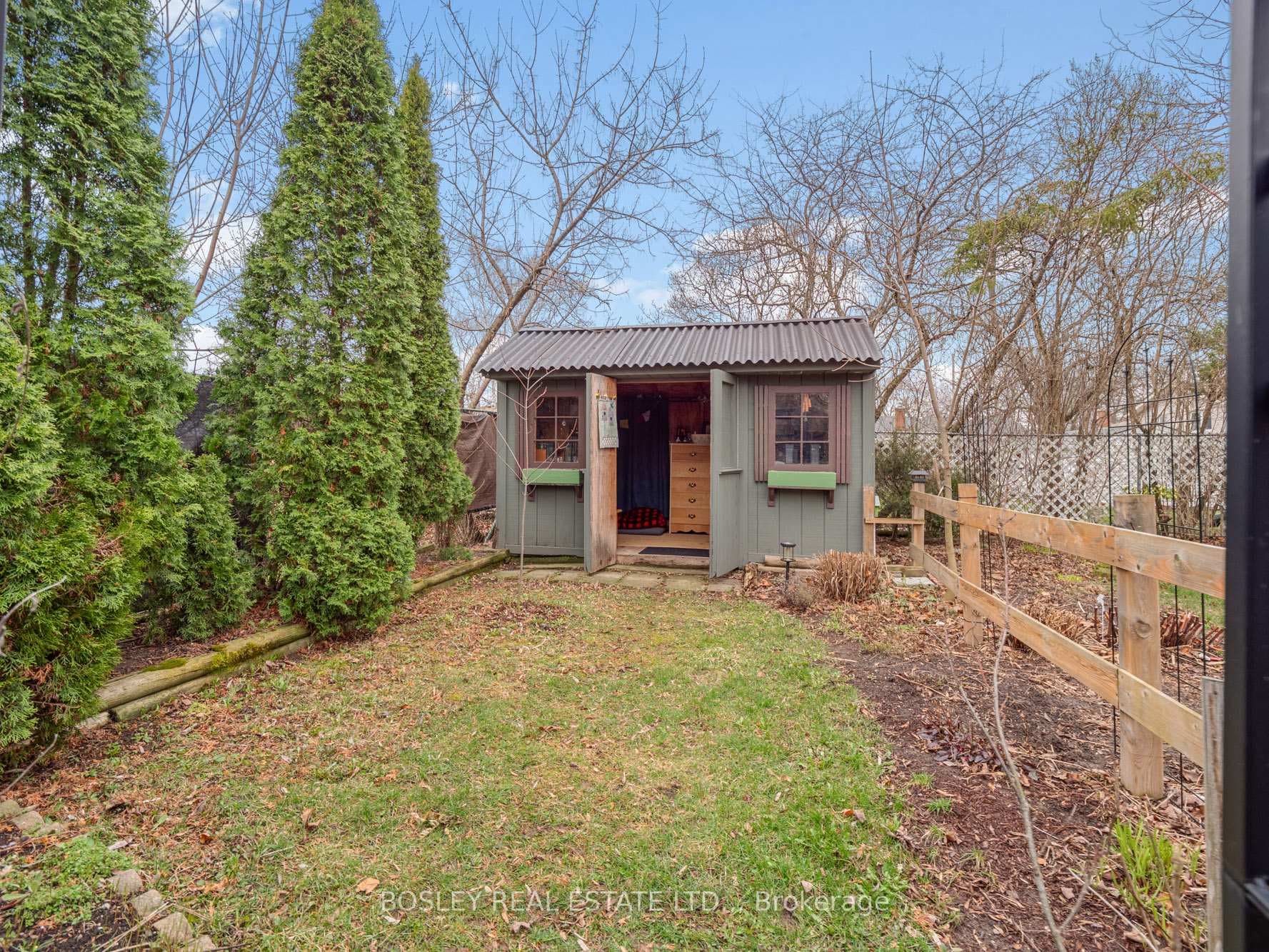Finished shed in back corner of property