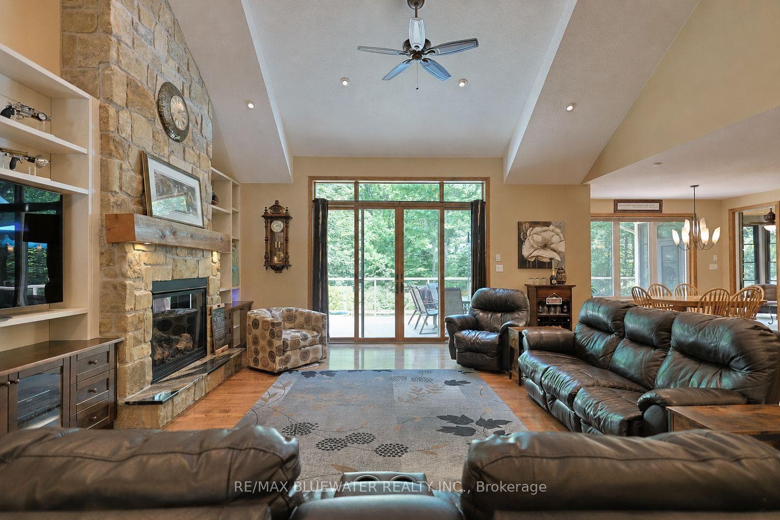 Great Room with Stone Fireplace feature wall