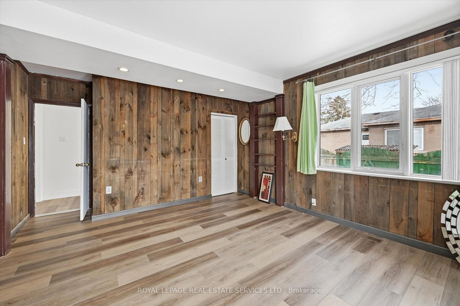 Wide-Plank SPC Vinyl Flooring in Primary Bedroom