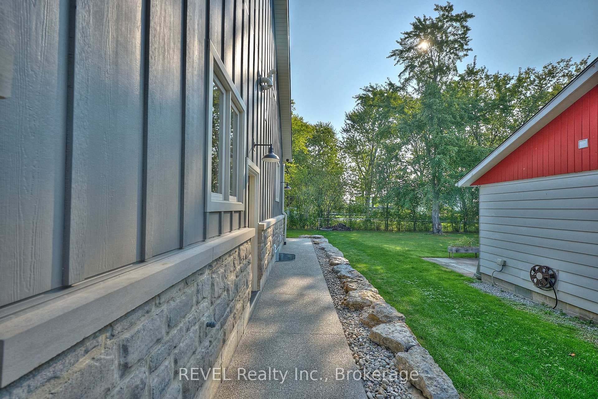 Landscaped walkway to back yard