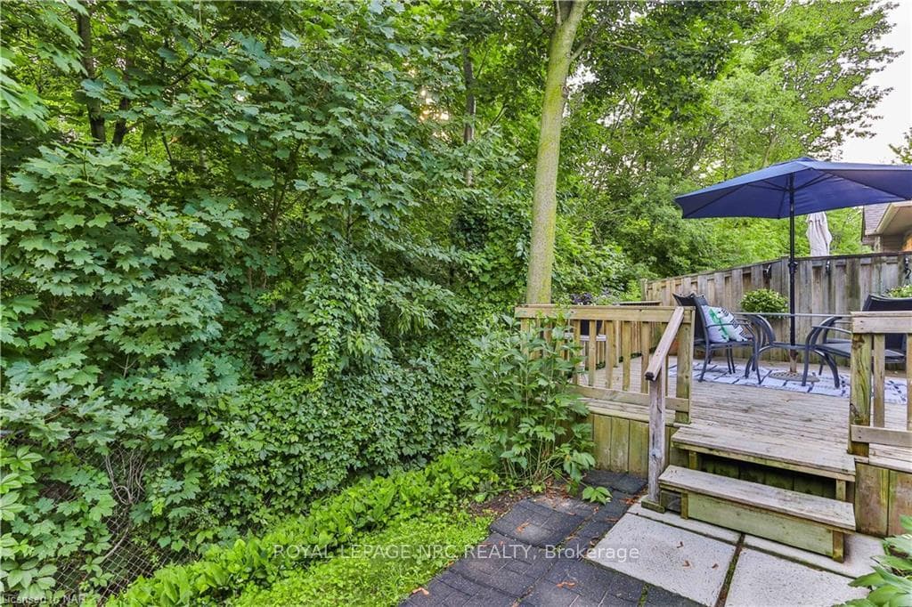 canopied greenspace behind unit