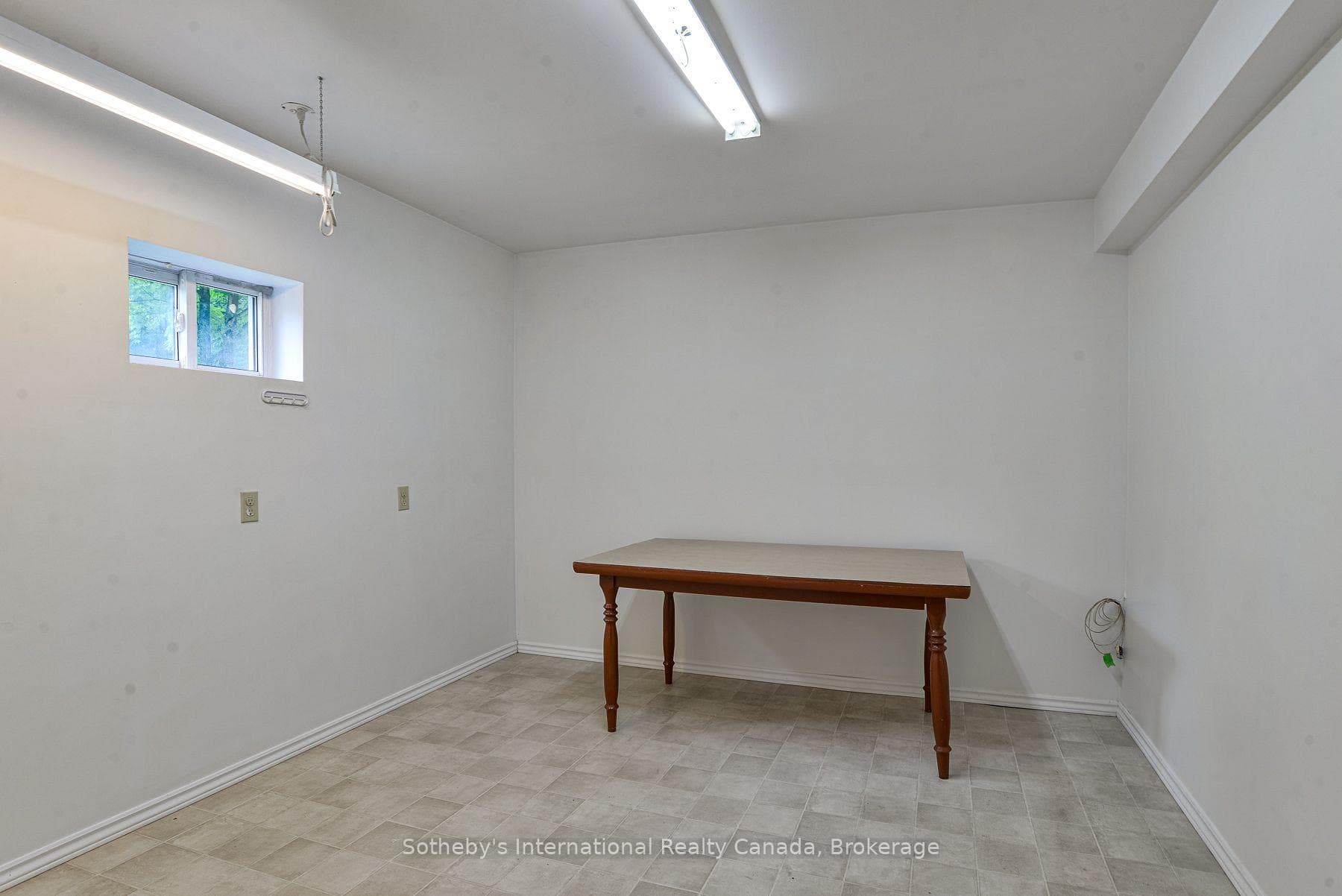 Potential den, home gym or office space.