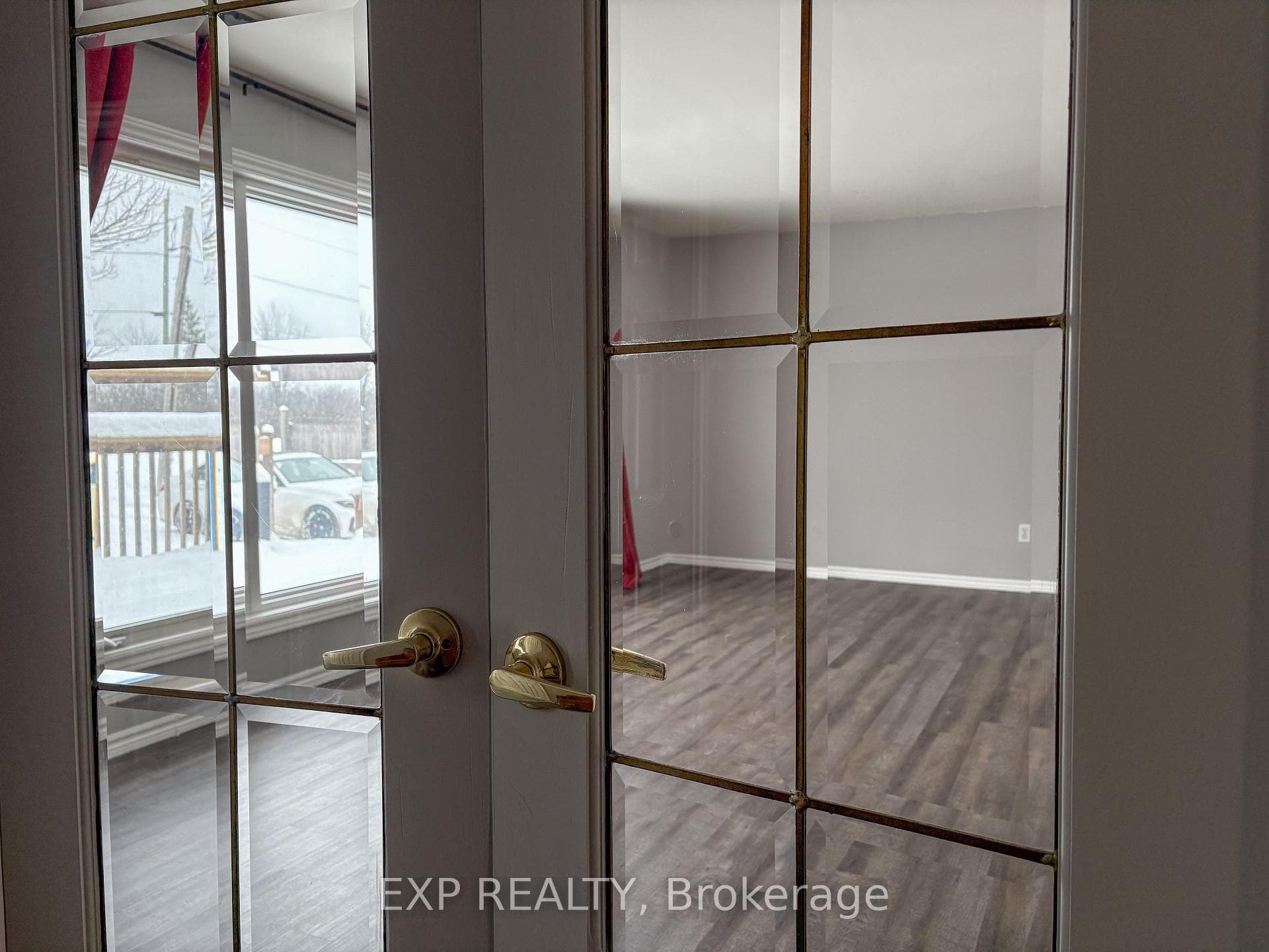 French doors grace the large living room