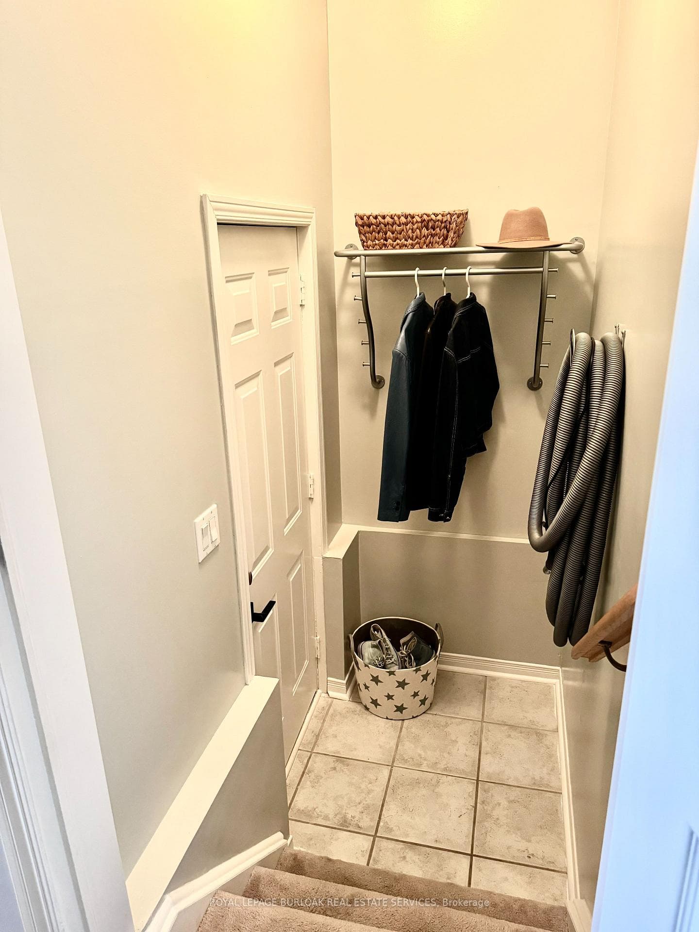 Convenient mud room with garage access.