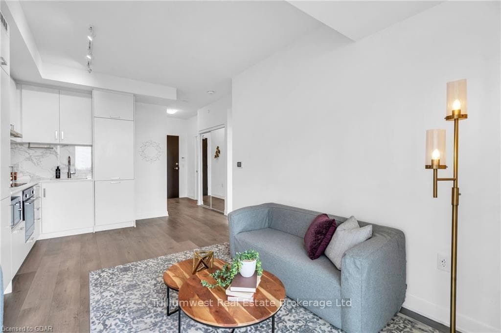 Living room featuring wood-type flooring