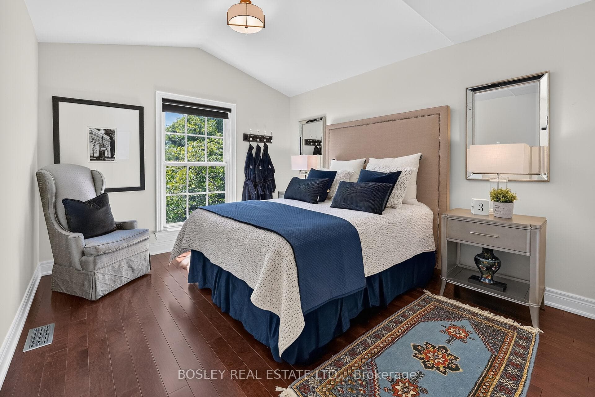 Guest bedroom with vaulted ceilings