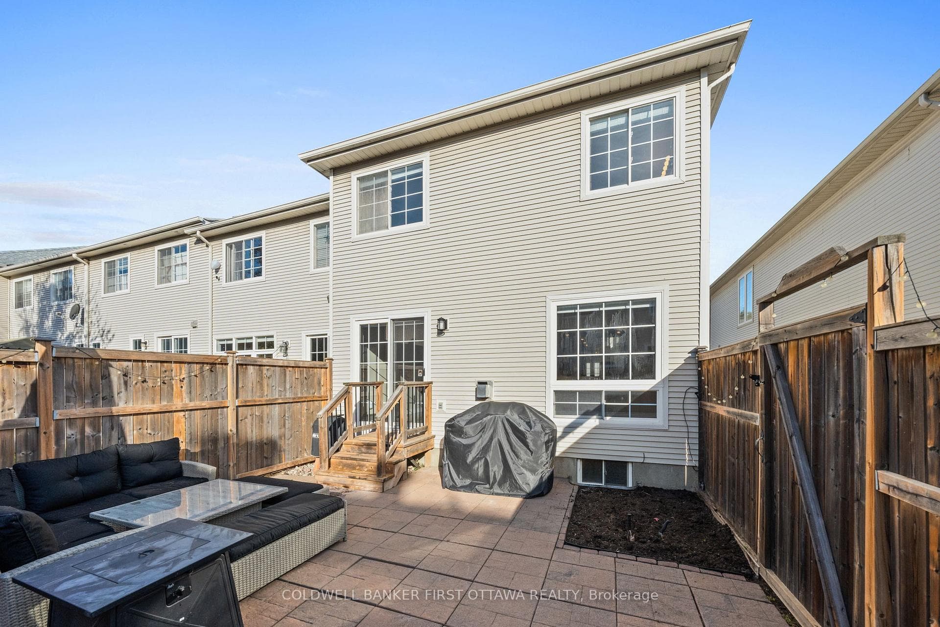 Backyard patio access from the left side of house.