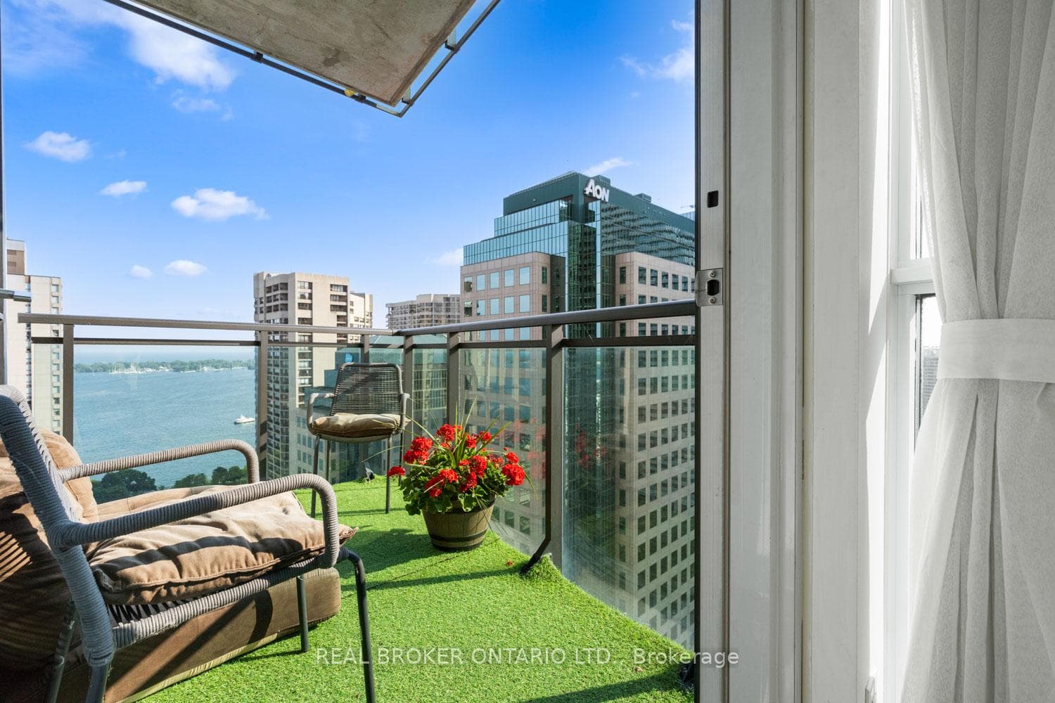 Balcony with great views of both water & city!