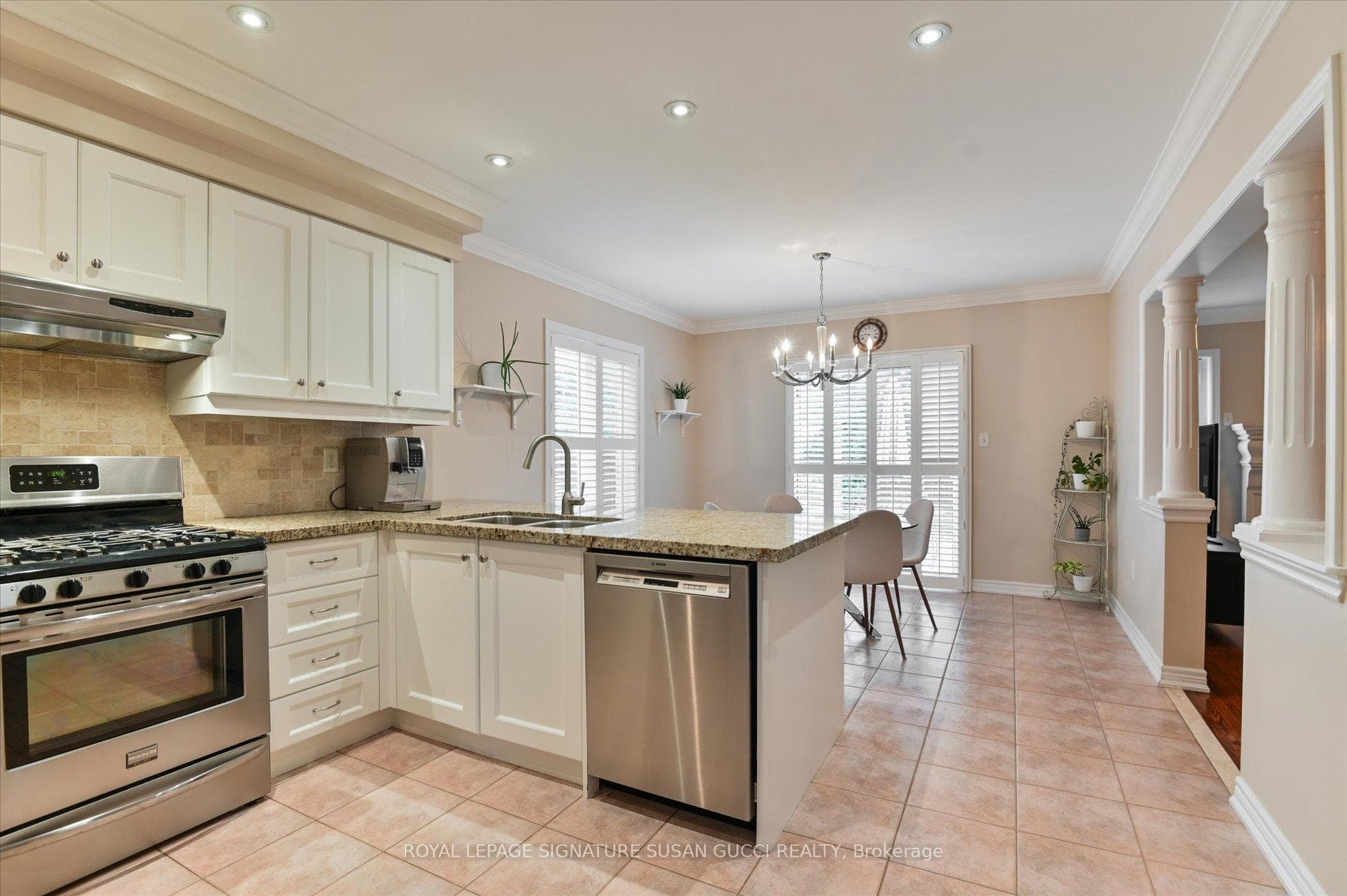 Eat in kitchen with stainless appliances