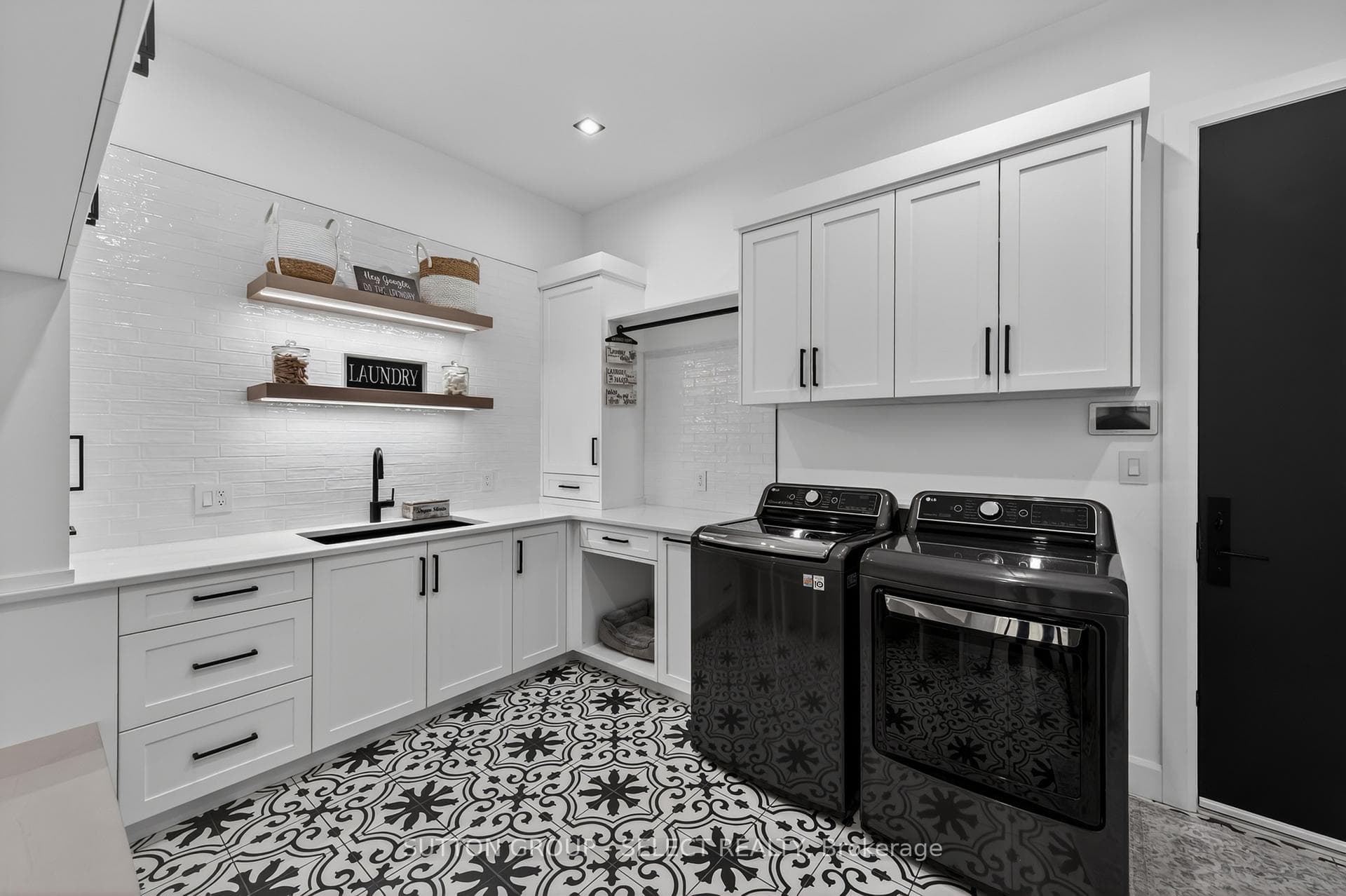 Laundry with lots of cabinets