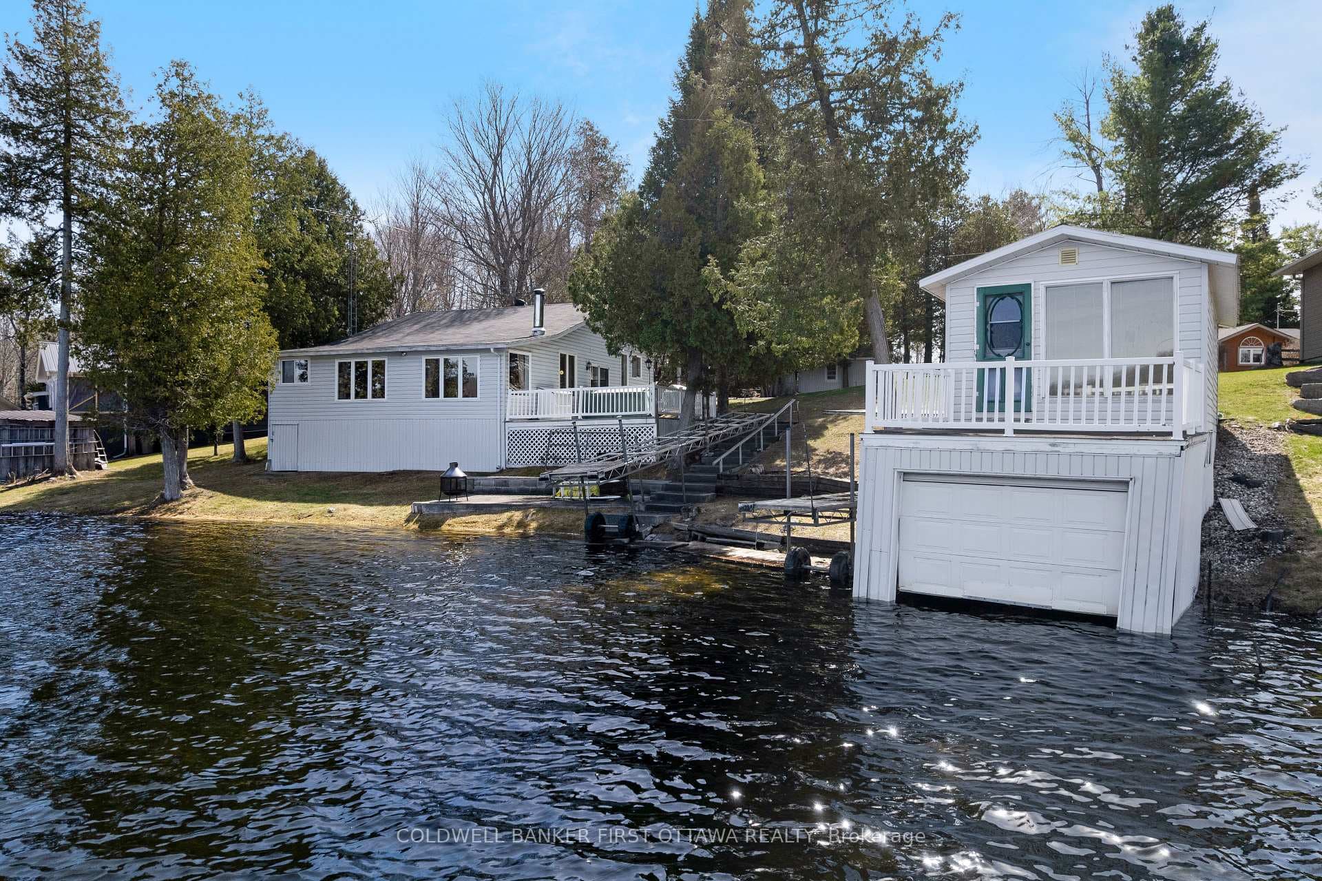 Home & boathouse with 1.6 acres, on Patterson Lake