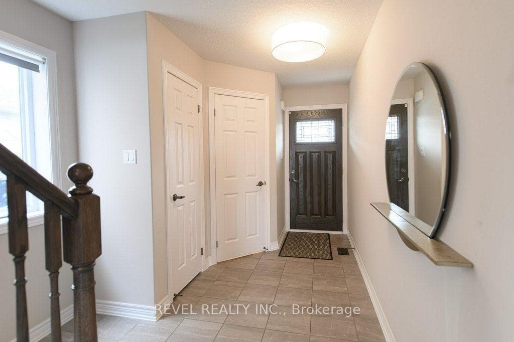 Foyer with 2 piece bath + closet