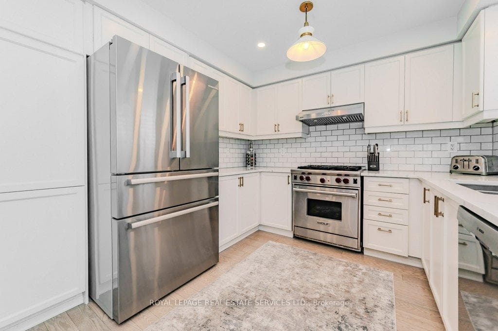 Contemporary Kitchen w/Quartz Counters & S/S Appls