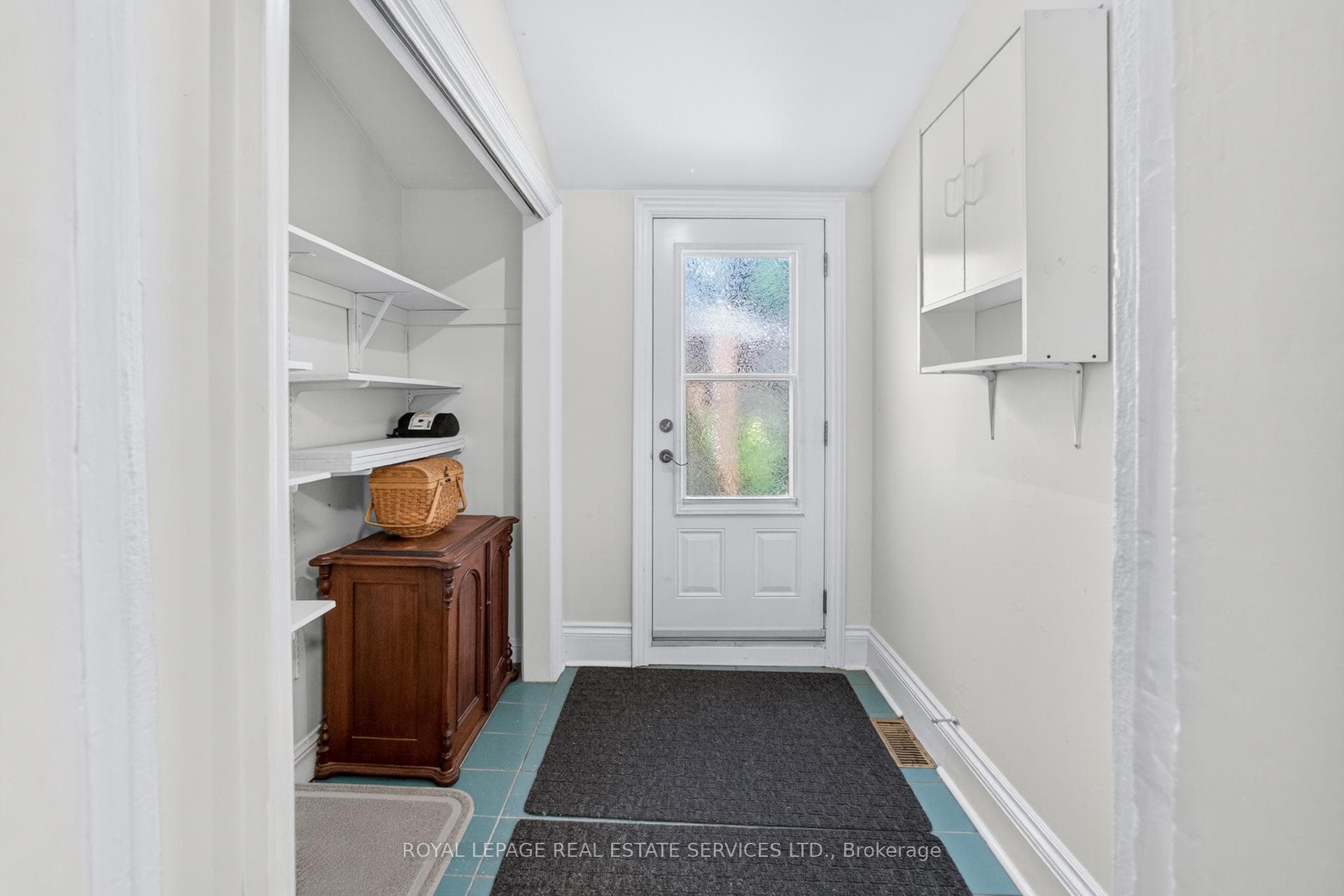 Main Flr Storage Area leading to Door to Backyard