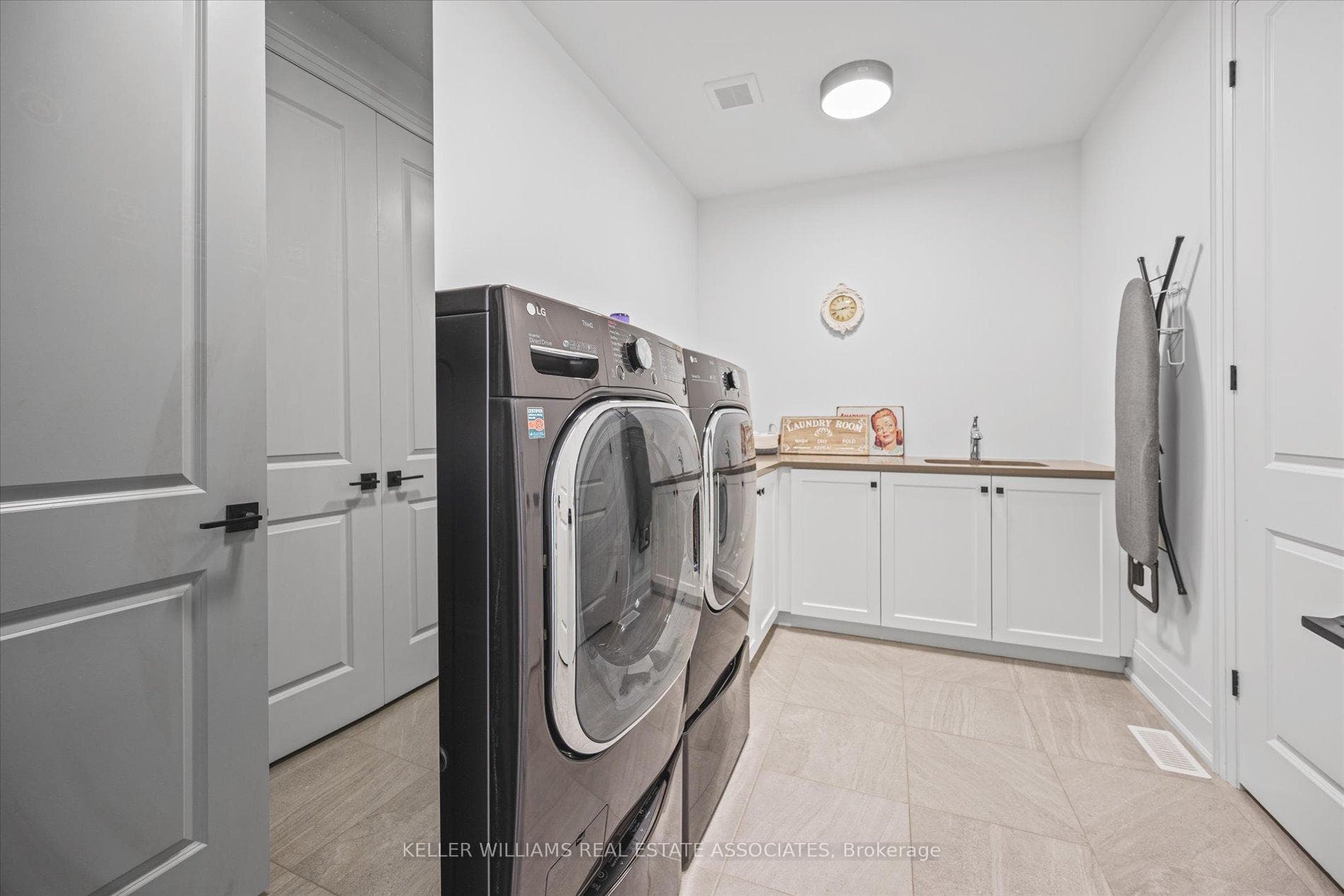 Upper Floor Laundry with Walk In Closet