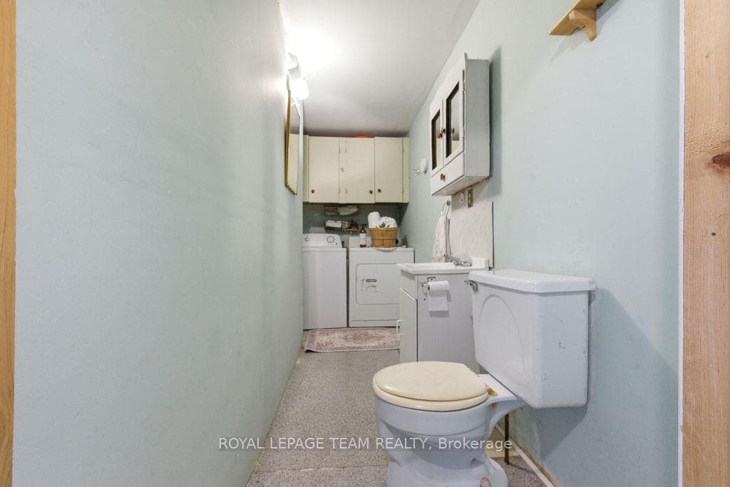 Powder room and laundry at rear entrance.