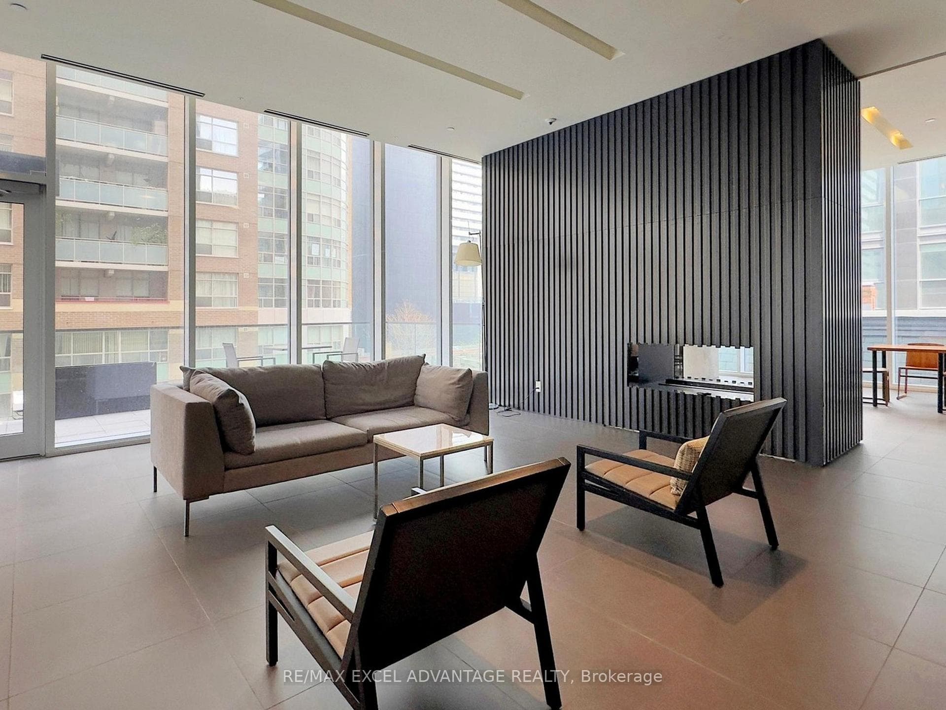 Stylish lounge with floor-to-ceiling windows.
