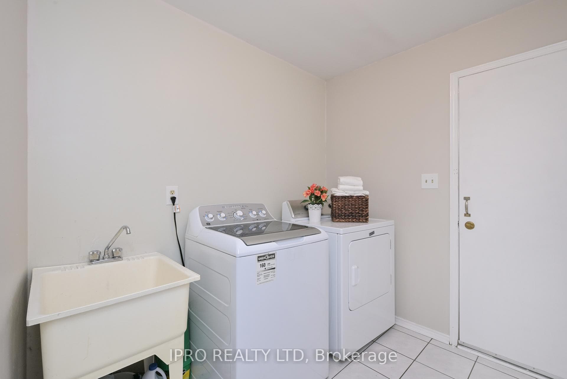 Main Floor Laundry with side yard access