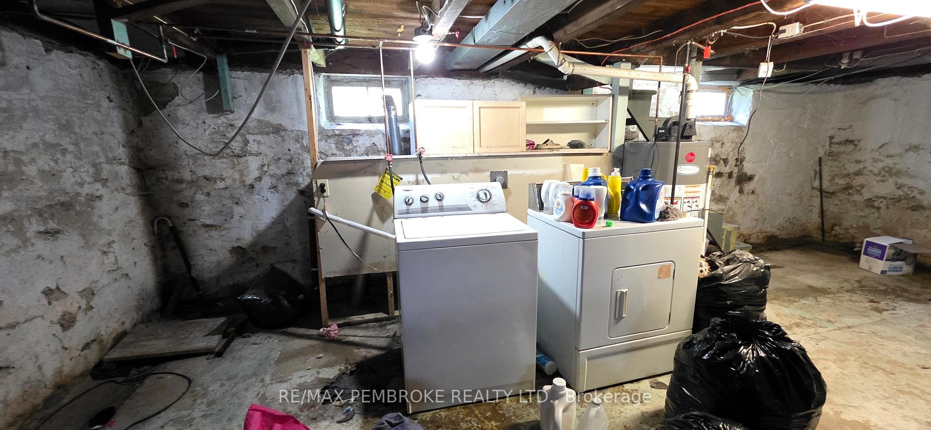 Basement laundry tucked out of sight