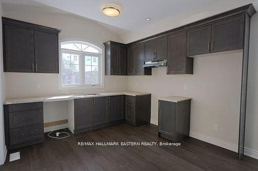 vaulted ceiling over kitchen sink