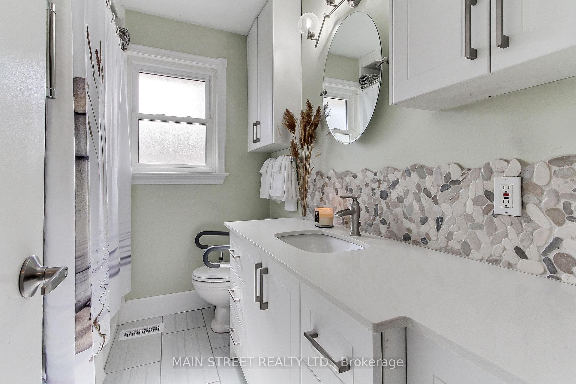 Quartz Counters and Stone Backsplash