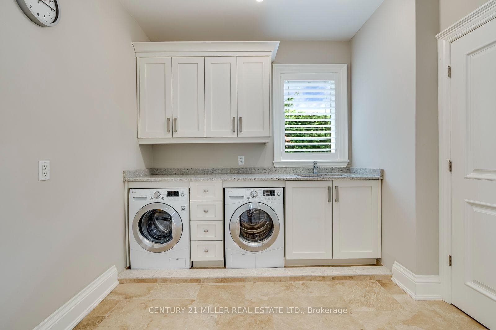 Laundry Room With Built-In Cabinetry