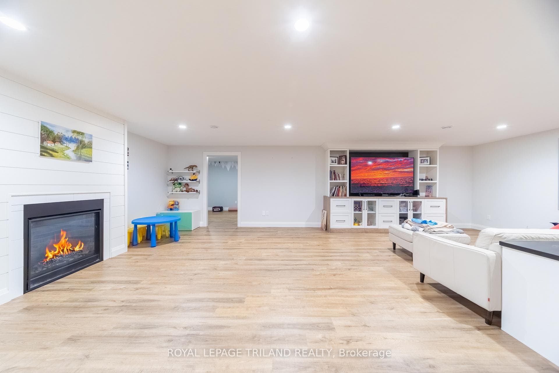 Lower level boasts another gas fireplace