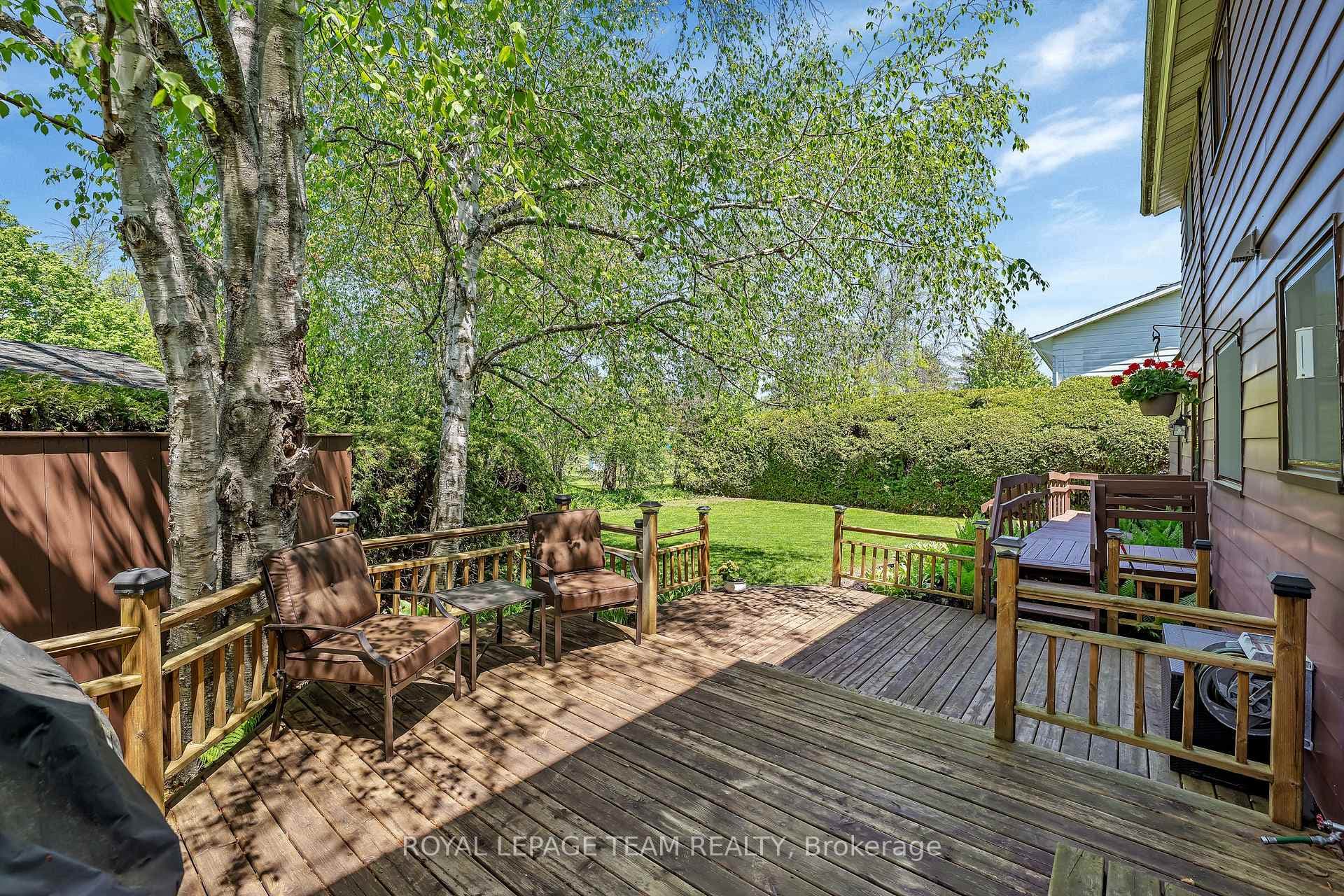 Spacious yd w/mature trees/gardens...backs on park