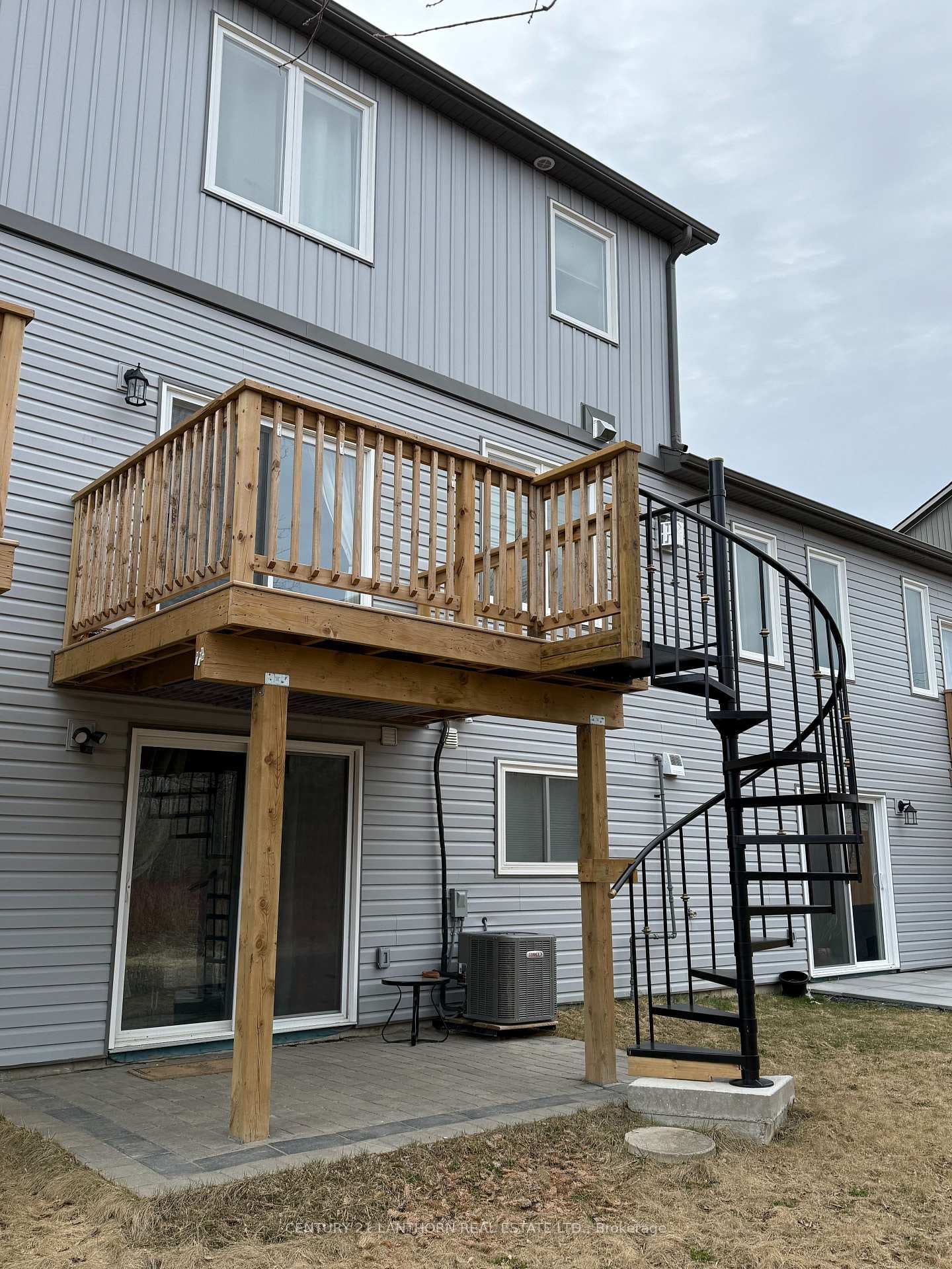 Deck with stair access to backyard