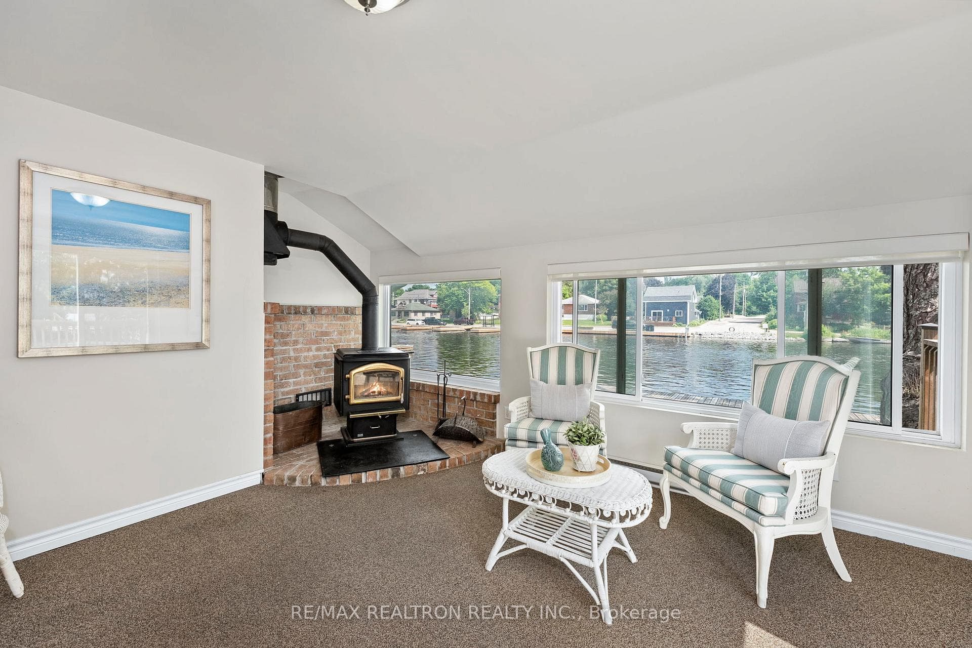 A lovely sunroom with a fireplace insert