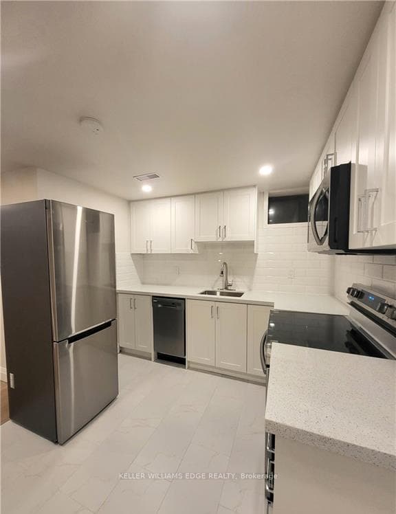 Kitchen w/ Stainless Steel Appliances