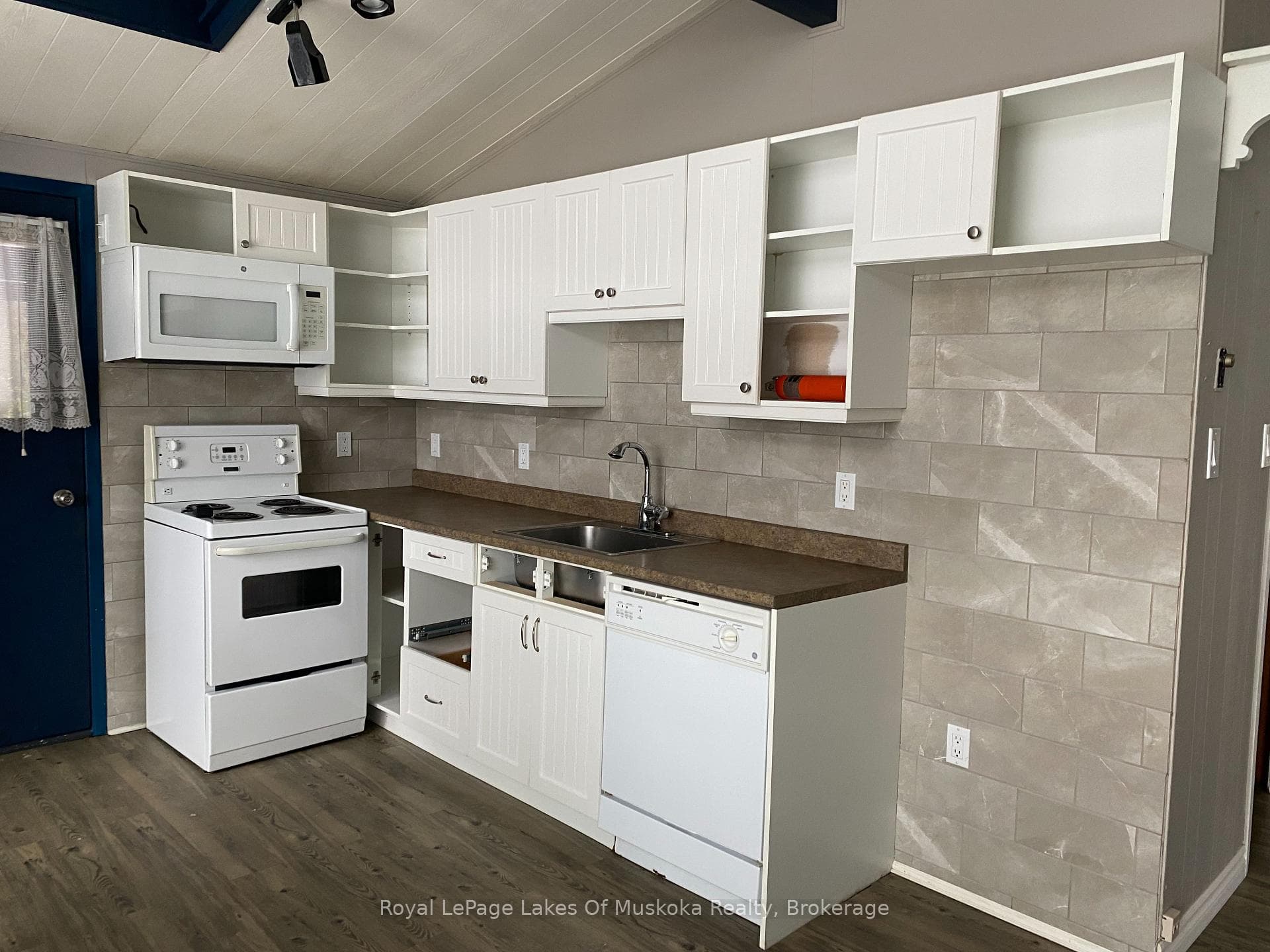 Kitchen with dishwasher and stove
