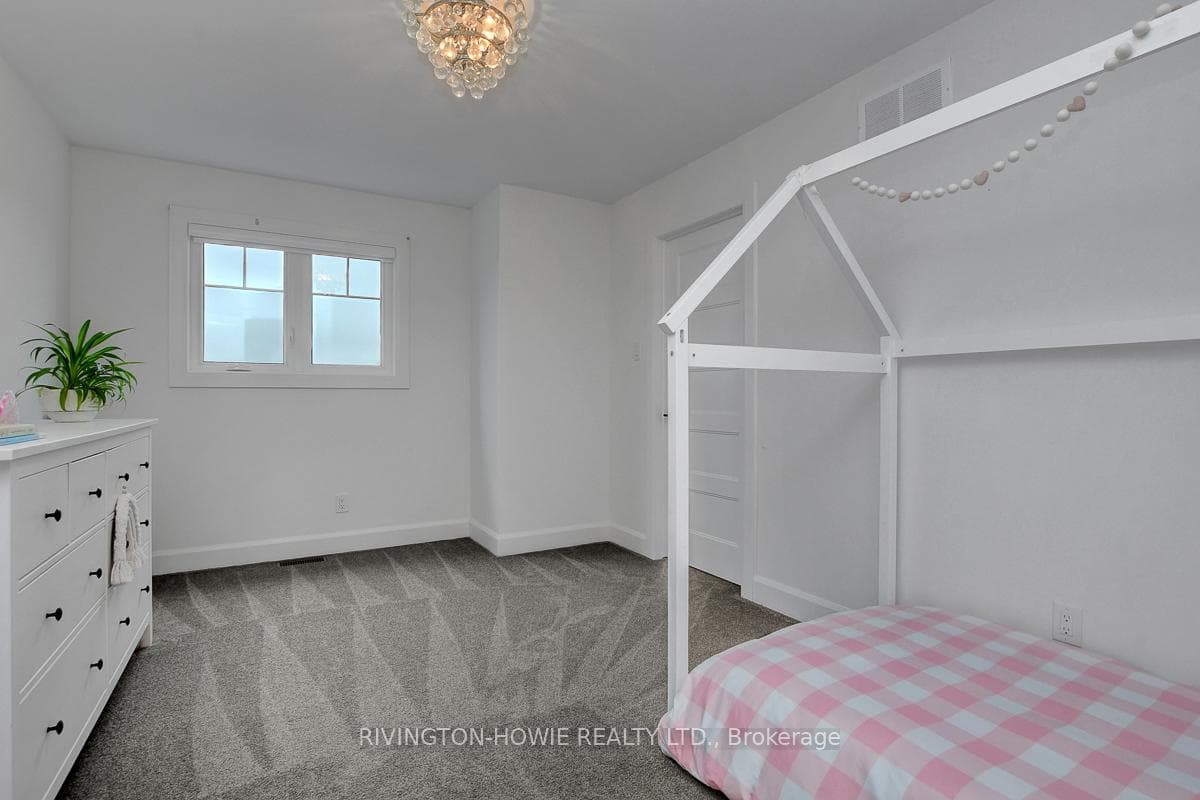 This bedroom features a walk-in closet