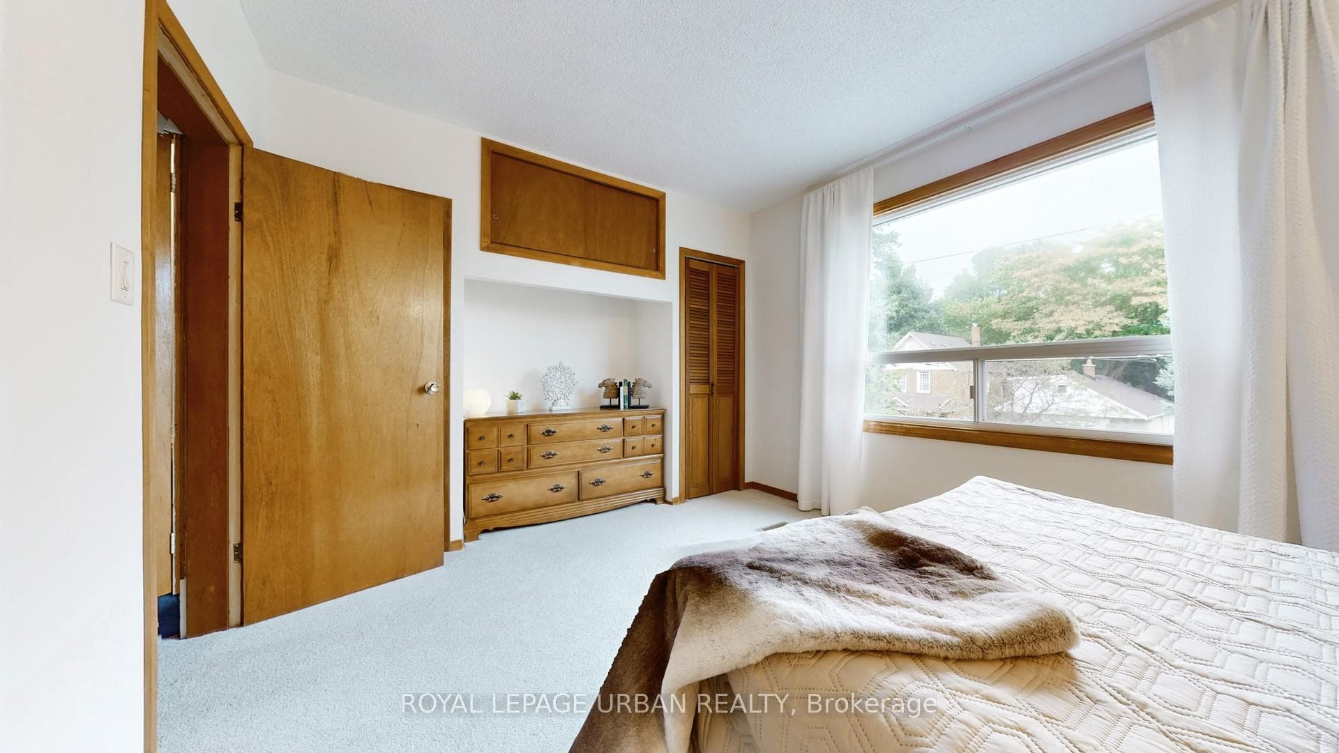 Primary Bedroom with Built-In Storage + 3 Closets