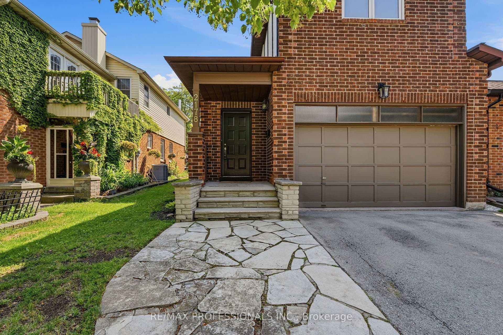 Flagstone Walkway Leads into Welcoming Entranceway
