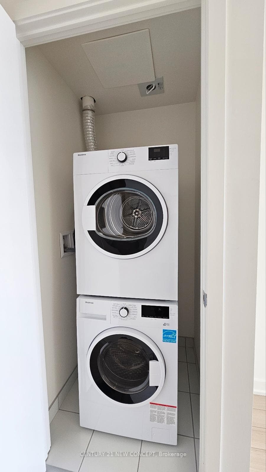 In-suite stacked washer and dryer