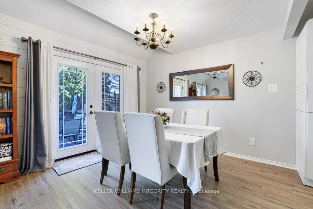 Spacious dining room with french doors to deck