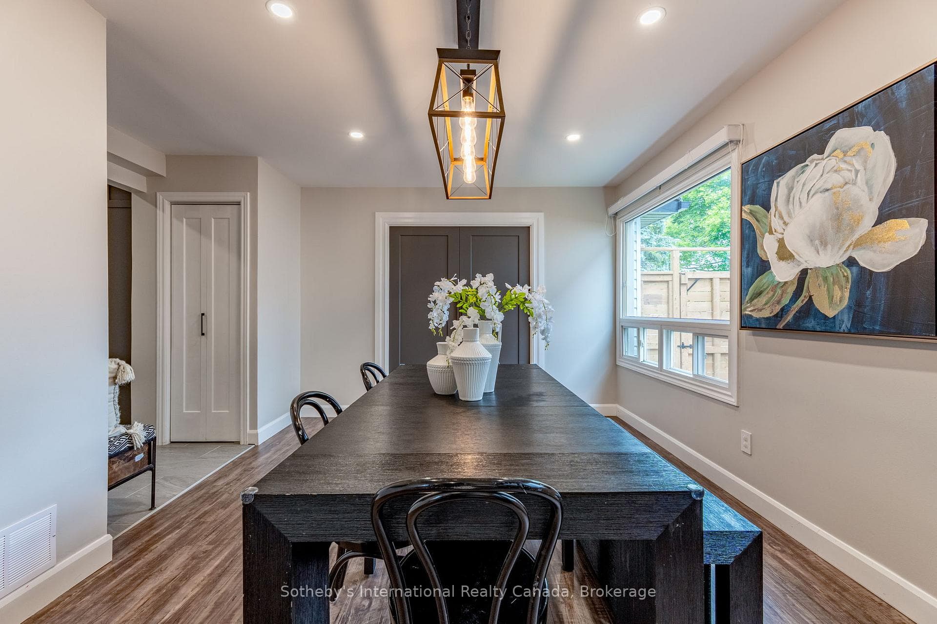 Generous dining room with convenient pantry.
