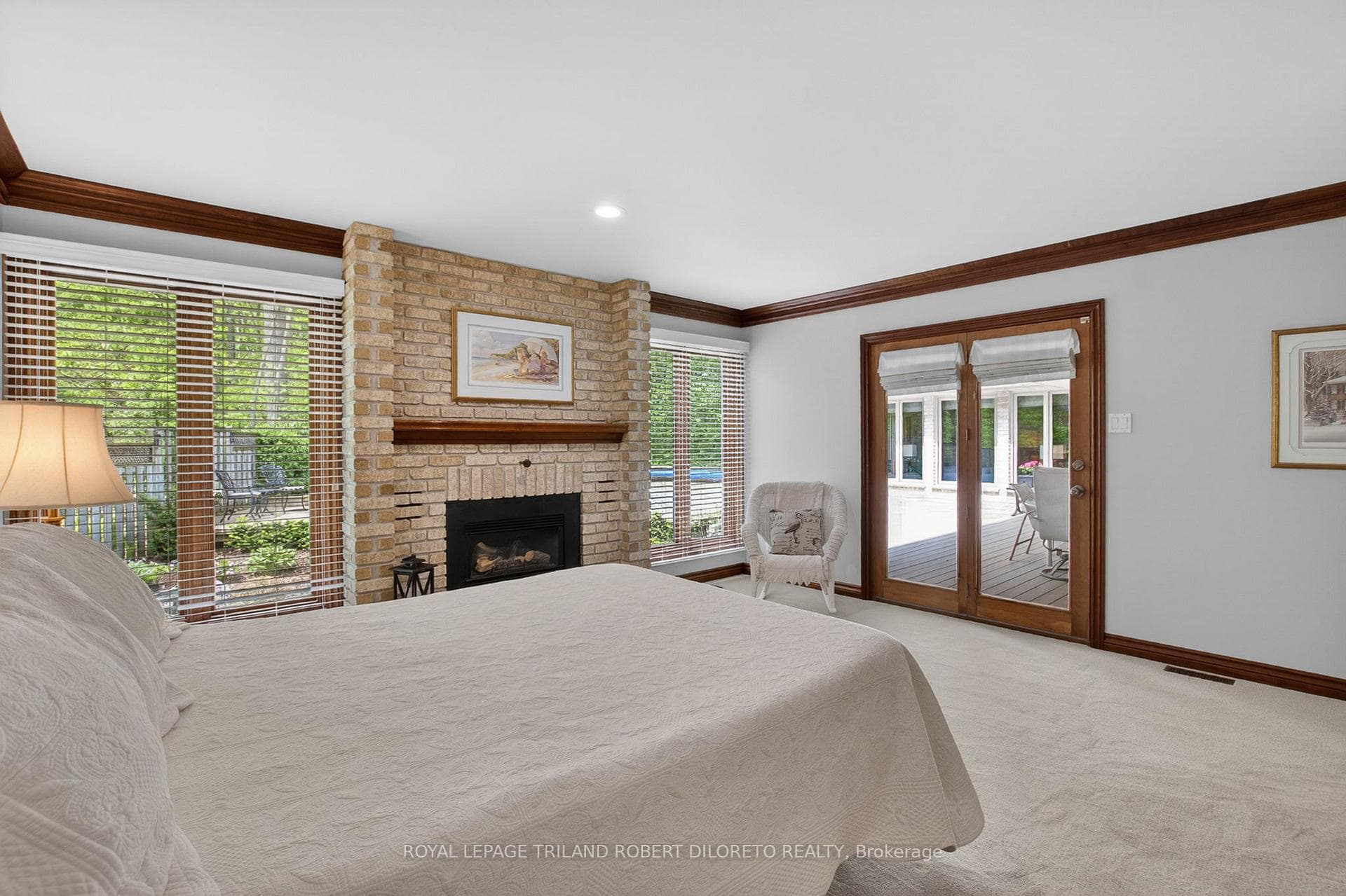 ....with gas fireplace & access to covered deck