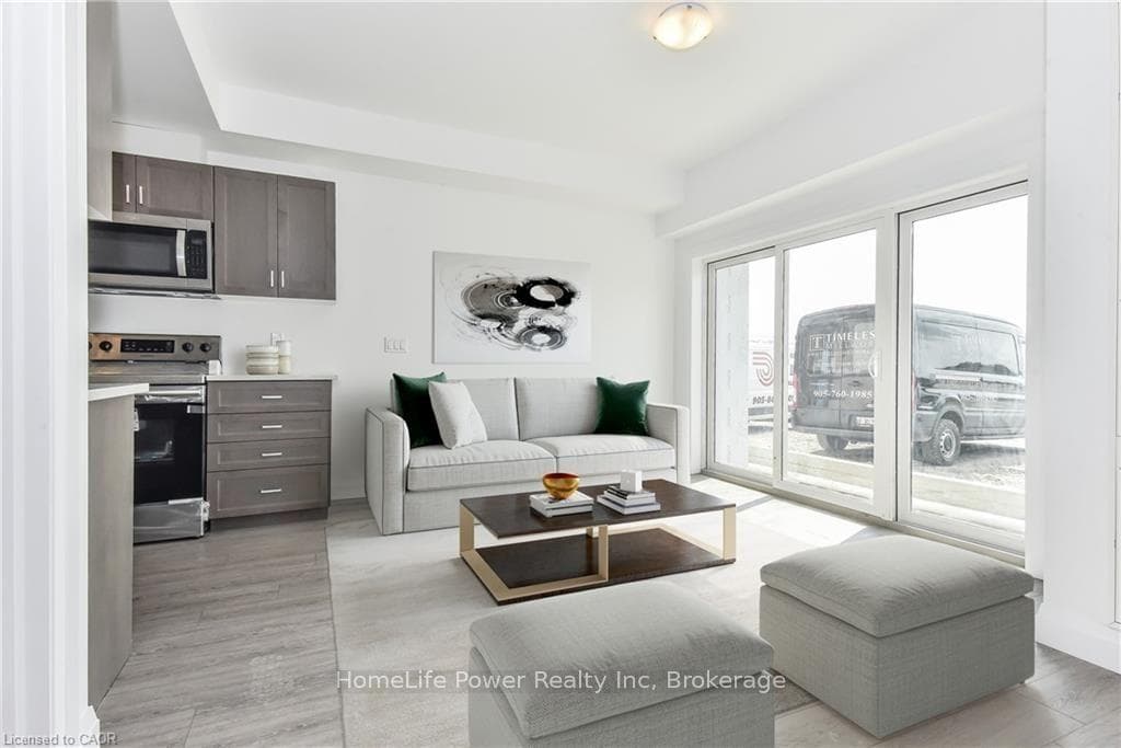 Open-concept living area (Virtually Staged)