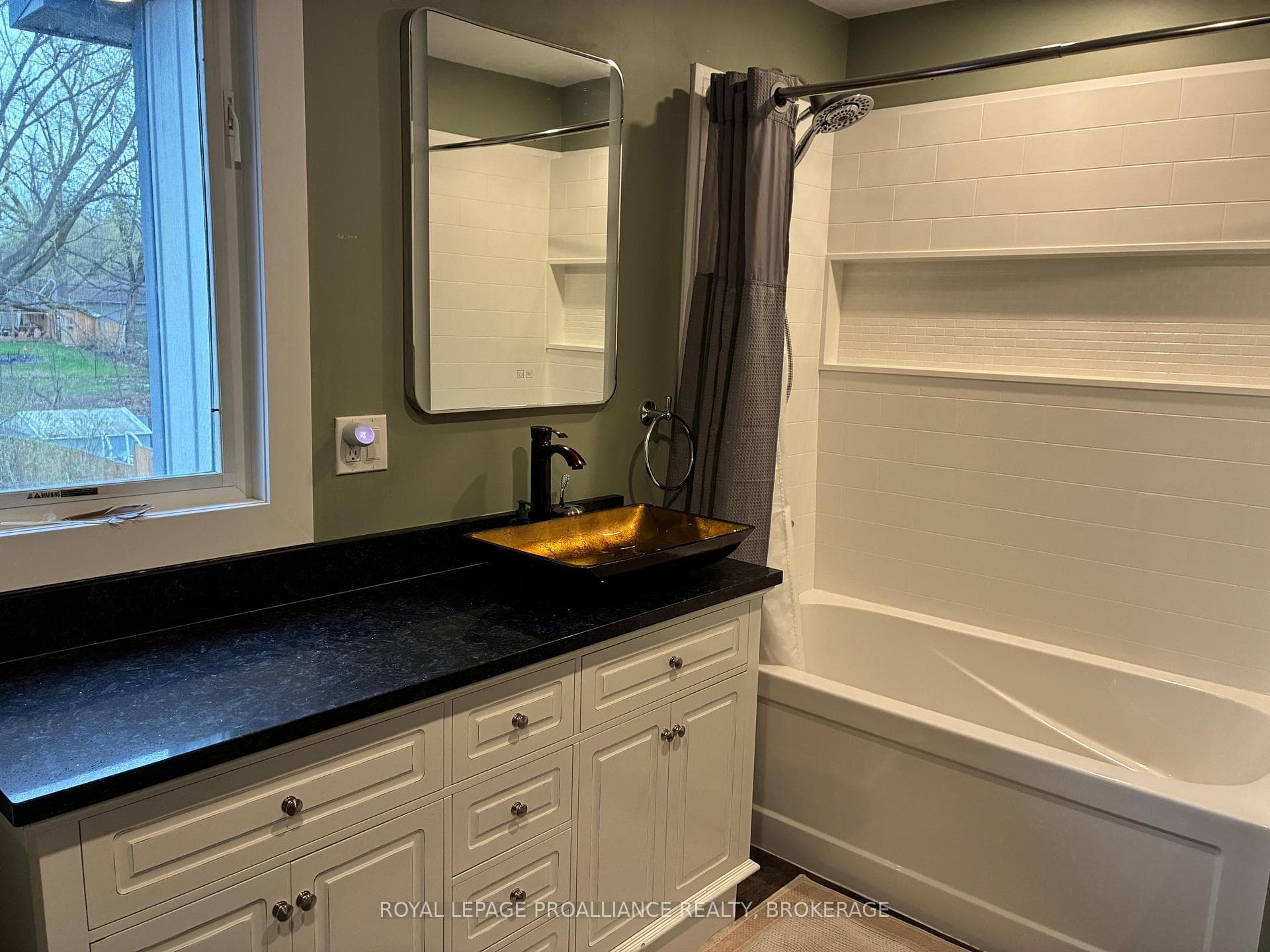 new tub surround and decorative sink
