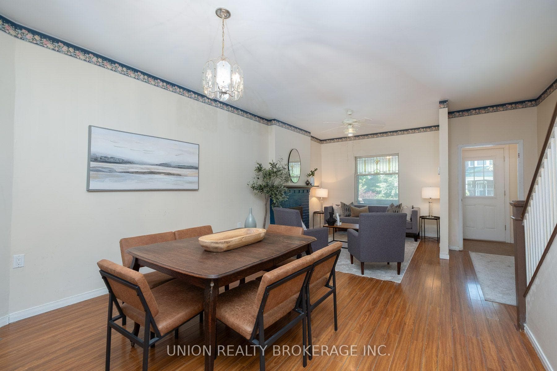 Open concept living/dining room with 8'11" ceiling