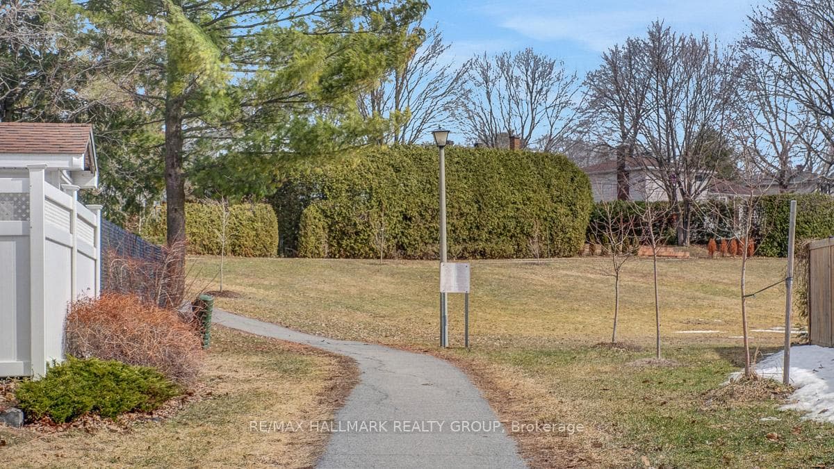 path across street through park area