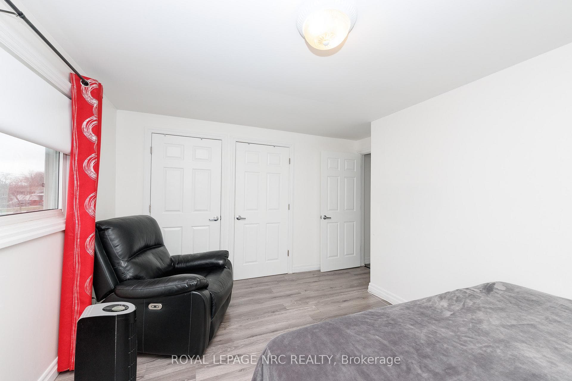 The primary bedroom boasts His & Hers closets.