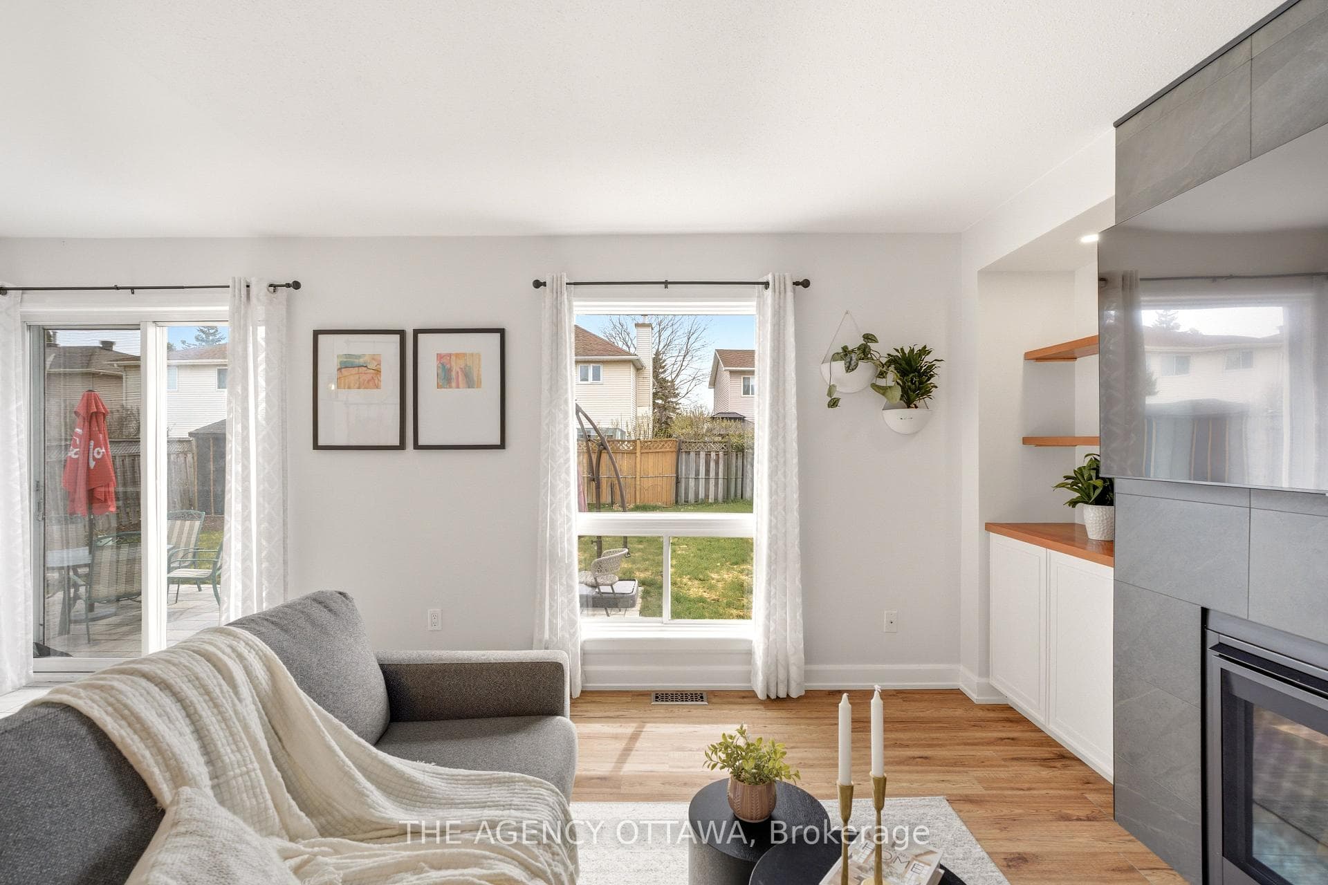 Airy living room with backyard views & nat. light