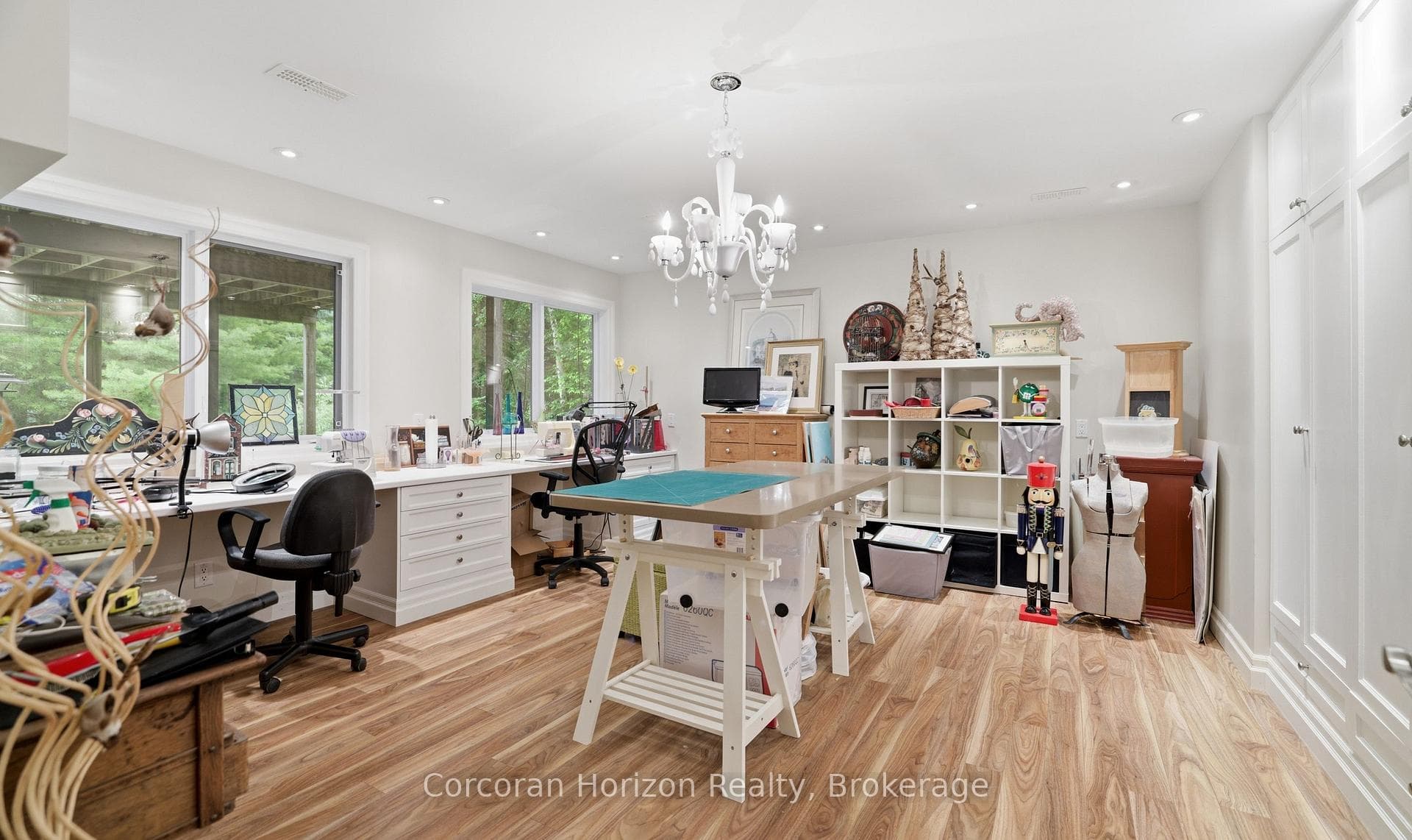 Craft room with built in cabinetry