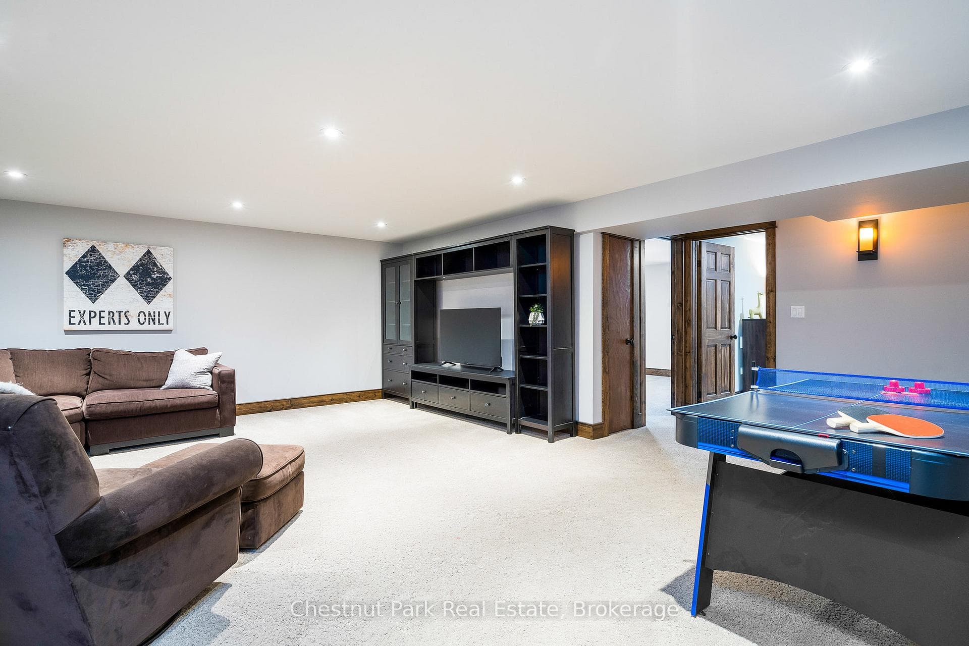 Large rec room with heated floors.