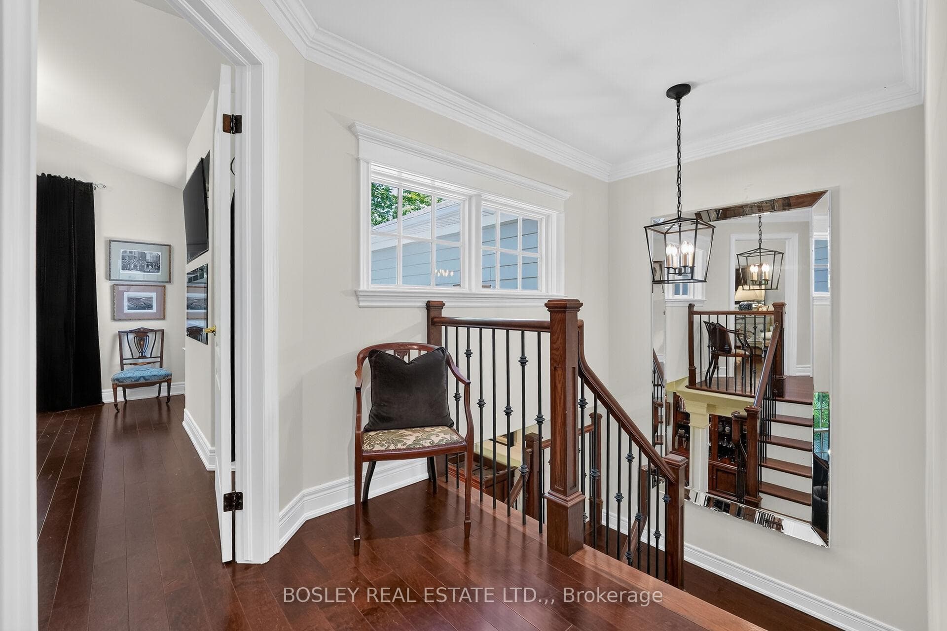 Natural light streams in the upper level foyer
