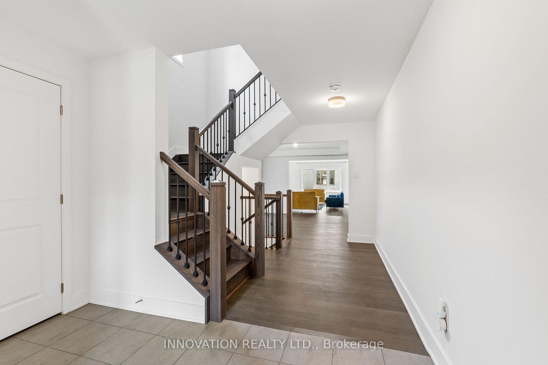Upgraded hardwood staircase.